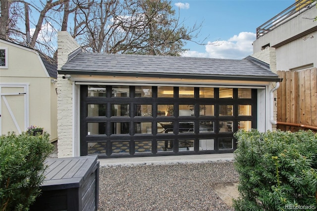 view of outdoor structure with fence