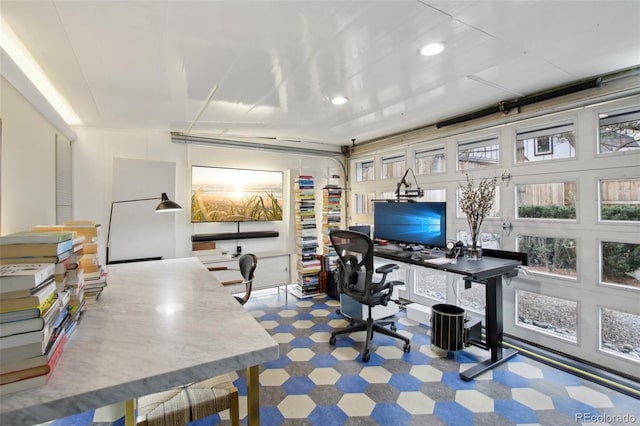 office with recessed lighting and tile patterned floors