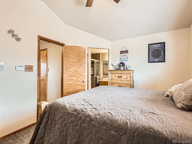 bedroom featuring carpet flooring, ensuite bathroom, vaulted ceiling, and ceiling fan