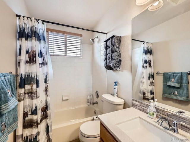 full bath featuring vanity, toilet, and shower / bath combo with shower curtain