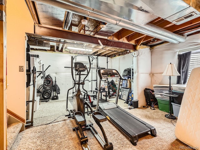 exercise area with carpet flooring and visible vents