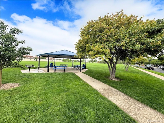 11395 E 116th Dr, Commerce City, CO 80640 - view of community featuring a lawn and a gazebo