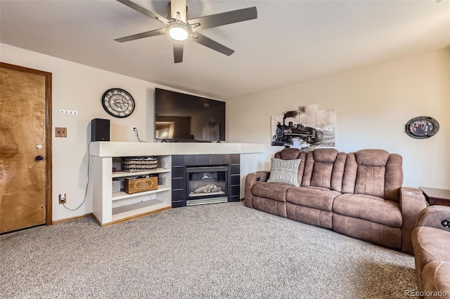 11395 E 116th Dr, Commerce City, CO 80640 - carpeted living area with a fireplace, ceiling fan, and baseboards