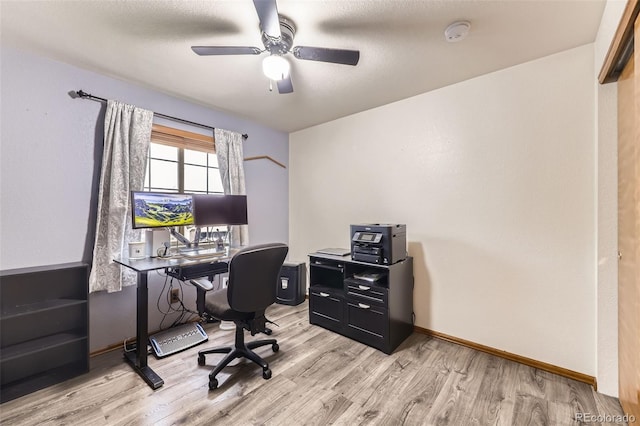 11395 E 116th Dr, Commerce City, CO 80640 - home office featuring light wood-style floors, ceiling fan, and baseboards