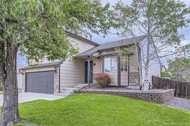 11395 E 116th Dr, Commerce City, CO 80640 - view of front of property with stone siding, driveway, and an attached garage