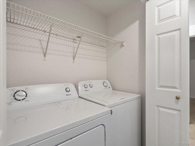 laundry room with laundry area and independent washer and dryer
