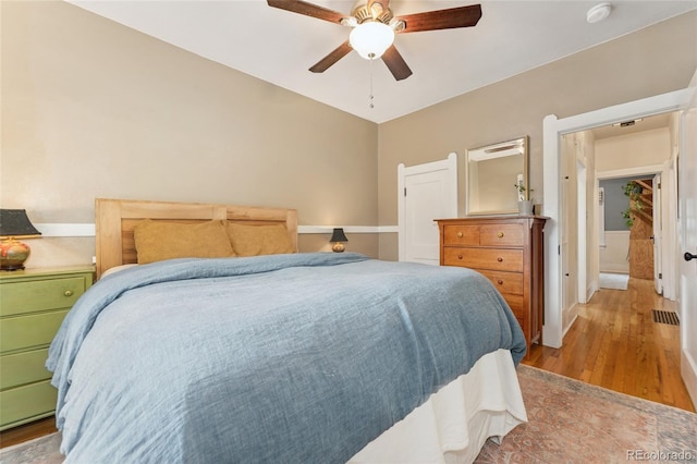 1215 Jackson St, Denver, CO 80206 - bedroom featuring light wood finished floors and ceiling fan