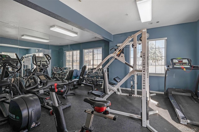 4451 S Ammons St Unit 4-108, Littleton, CO 80123 - exercise room featuring baseboards