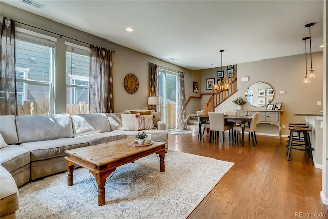 living room with light hardwood / wood-style floors