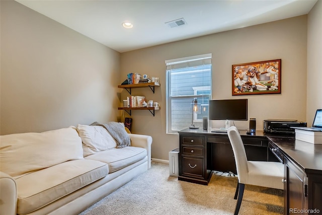 office with light colored carpet and plenty of natural light