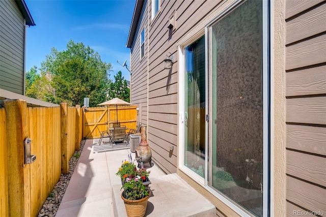 view of property exterior with a patio