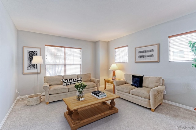 14214 Lakeview Ln, Broomfield, CO 80023 - living area with healthy amount of natural light, carpet floors, and baseboards
