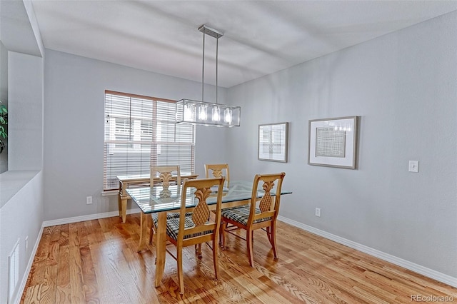 14214 Lakeview Ln, Broomfield, CO 80023 - dining room featuring light wood-style floors and baseboards