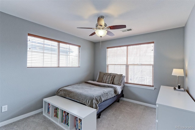 14214 Lakeview Ln, Broomfield, CO 80023 - bedroom with baseboards, light carpet, and a ceiling fan