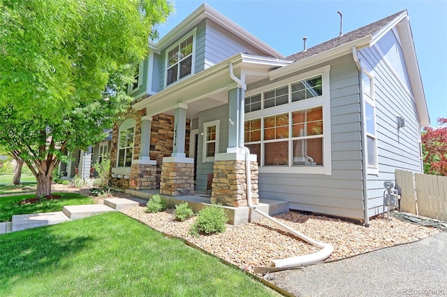 14214 Lakeview Ln, Broomfield, CO 80023 - view of front of property with a porch and stone siding