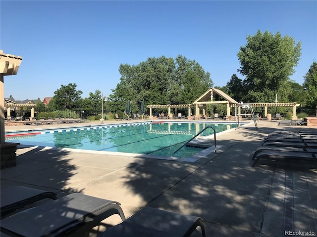 14214 Lakeview Ln, Broomfield, CO 80023 - community pool with a pergola and a patio area