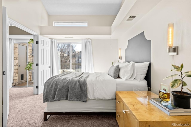 carpeted bedroom with visible vents