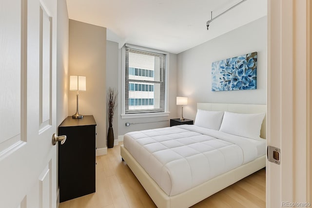 444 17th St Unit 701, Denver, CO 80202 - bedroom featuring light wood-style flooring