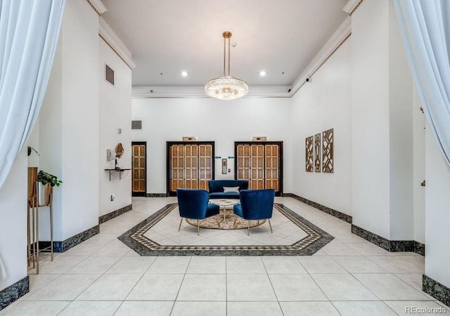 444 17th St Unit 701, Denver, CO 80202 - building lobby with a high ceiling, crown molding, and recessed lighting