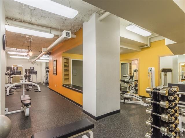 444 17th St Unit 701, Denver, CO 80202 - workout area featuring baseboards
