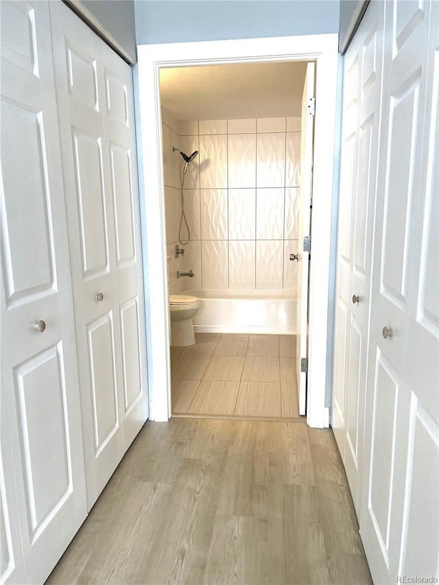 444 17th St Unit 701, Denver, CO 80202 - hallway with wood finished floors