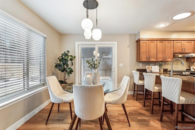 dining room featuring light wood-type flooring