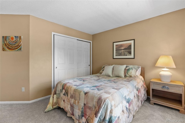 2181 E Phillips Ln, Centennial, CO 80122 - carpeted bedroom with a closet and a textured ceiling
