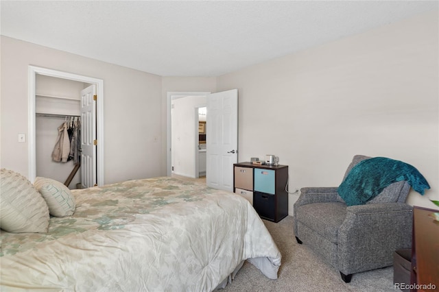 2181 E Phillips Ln, Centennial, CO 80122 - bedroom with light carpet and a spacious closet