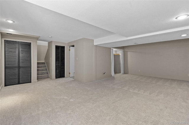 2181 E Phillips Ln, Centennial, CO 80122 - finished basement with carpet flooring, stairway, and recessed lighting