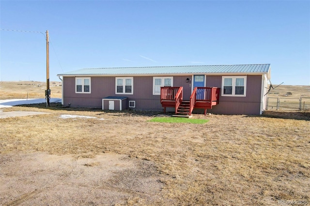 manufactured / mobile home featuring a wooden deck