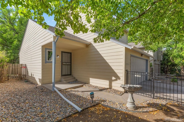 view of front of property featuring a garage