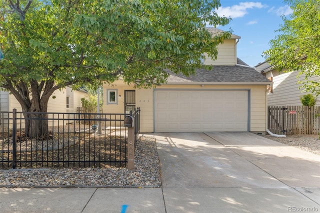 obstructed view of property featuring a garage