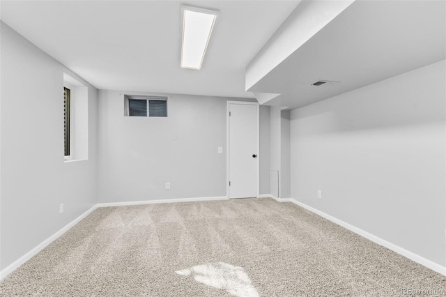 basement featuring carpet flooring