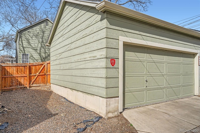 garage featuring fence