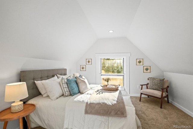 carpeted bedroom featuring vaulted ceiling