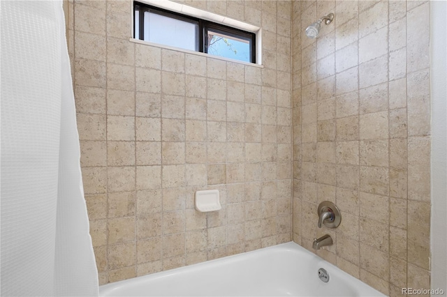 full bath with shower / tub combo with curtain