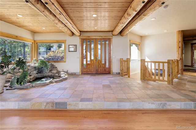 entryway featuring wood finished floors, baseboards, beam ceiling, recessed lighting, and wooden ceiling