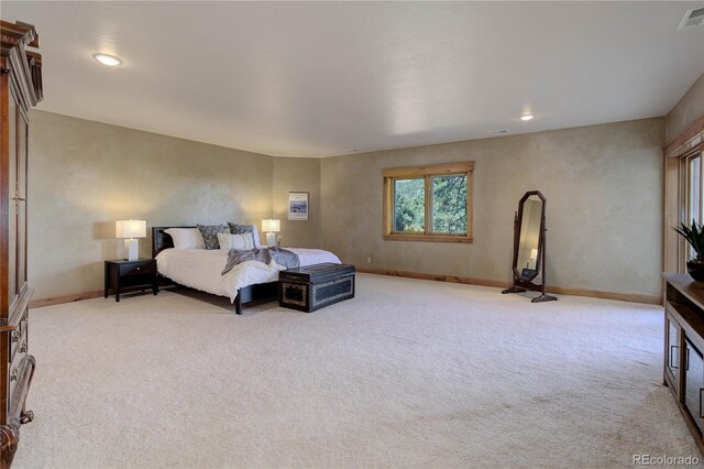 4440 Monitor Rock Ln, Colorado Springs, CO 80904 - bedroom with light carpet and recessed lighting