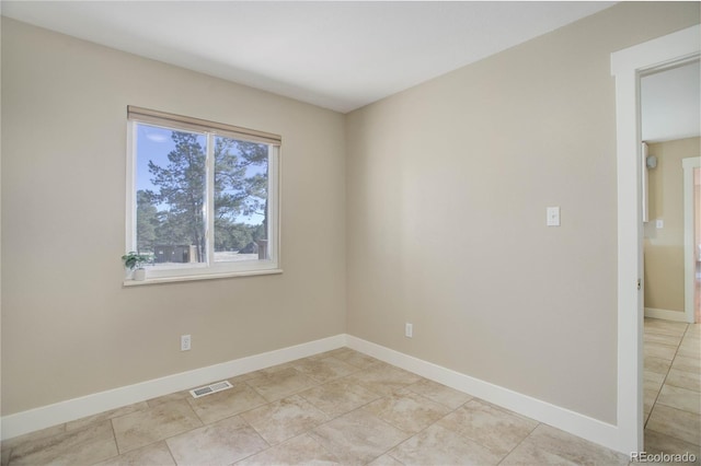 view of tiled empty room