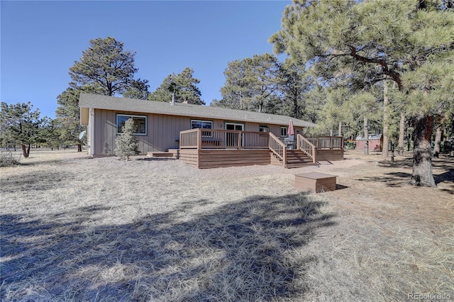 view of front of home with a wooden deck