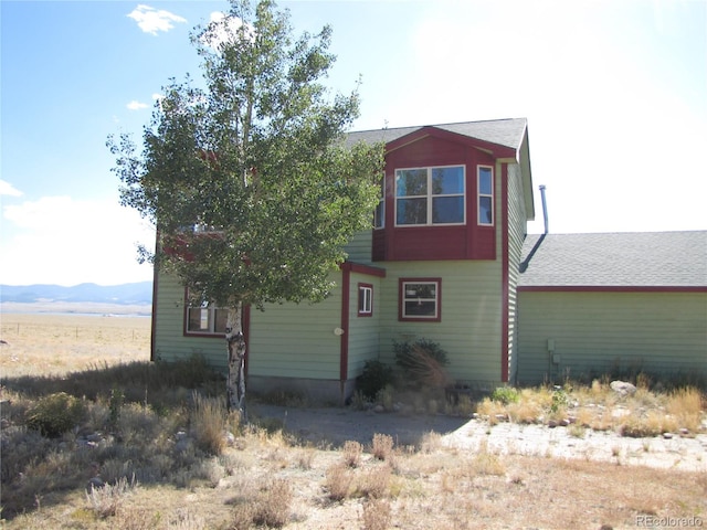 exterior space with a mountain view