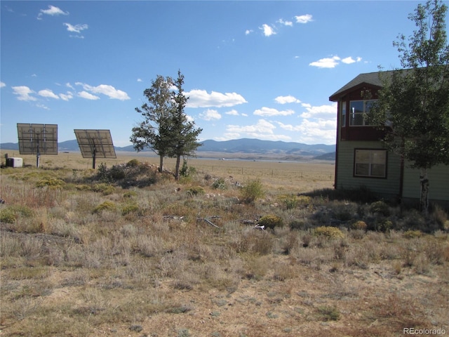 property view of mountains with a rural view