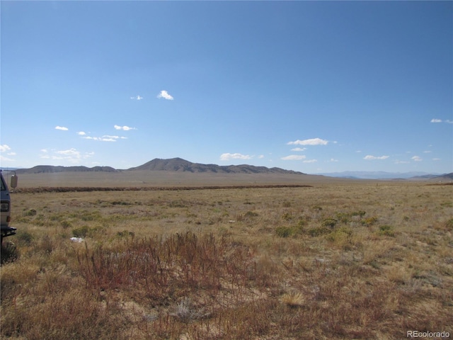 view of mountain feature featuring a rural view