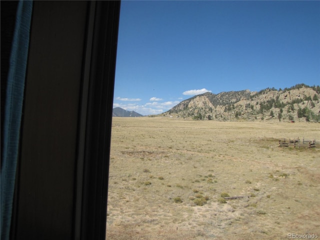 view of mountain feature featuring a rural view