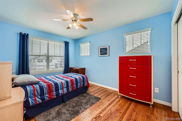 bedroom featuring ceiling fan and wood-type flooring