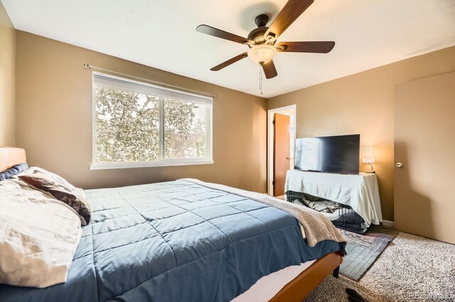 13661 W Tufts Ave, Morrison, CO 80465 - bedroom with carpet flooring and a ceiling fan