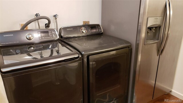 13661 W Tufts Ave, Morrison, CO 80465 - laundry area featuring laundry area and washer and dryer