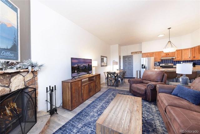 living area featuring a fireplace