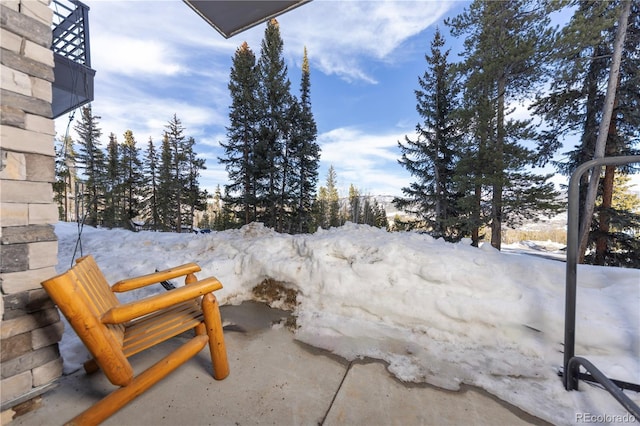 view of snow covered patio