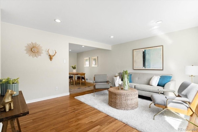 6314 Brooks Dr, Arvada, CO 80004 - living room with wood finished floors, baseboards, and recessed lighting